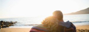 successful couple financial planning on the beach
